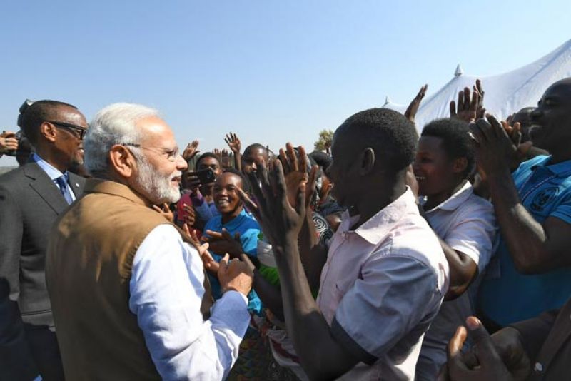 PM Modi interacts with villagers from Rweru before leaving for Uganda