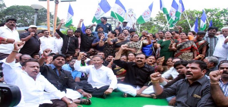 YSRC activists staged a protest outside the RTC bus station