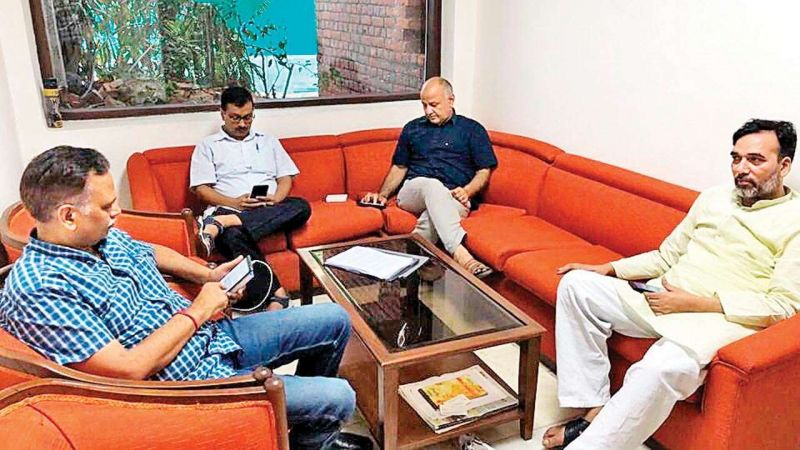 Arvind Kejriwal and his three cabinet colleagues
