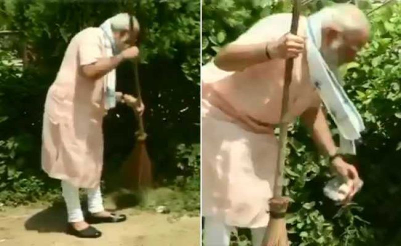 Modi cleaned the school surroundings with a broom