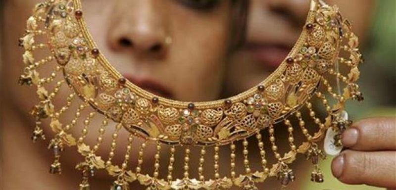 Gold prices edged higher by Rs 15