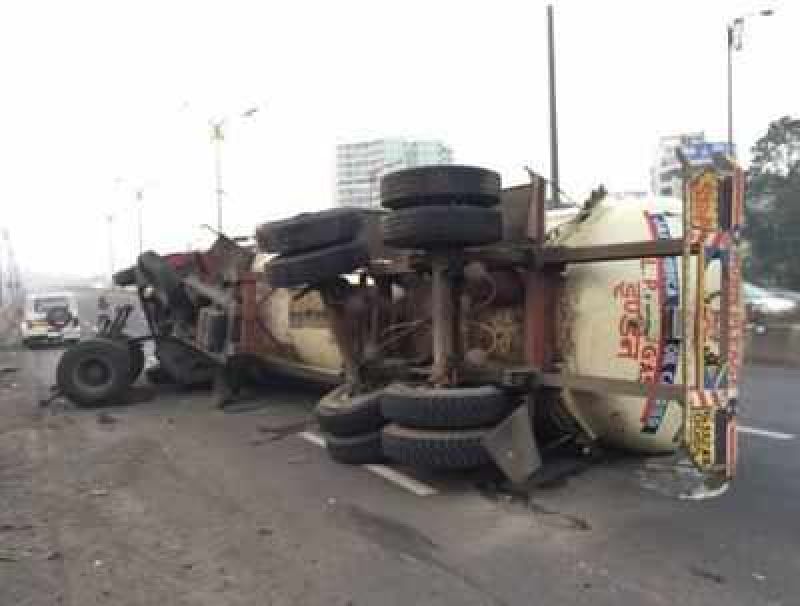 Truck overturned and caught fire