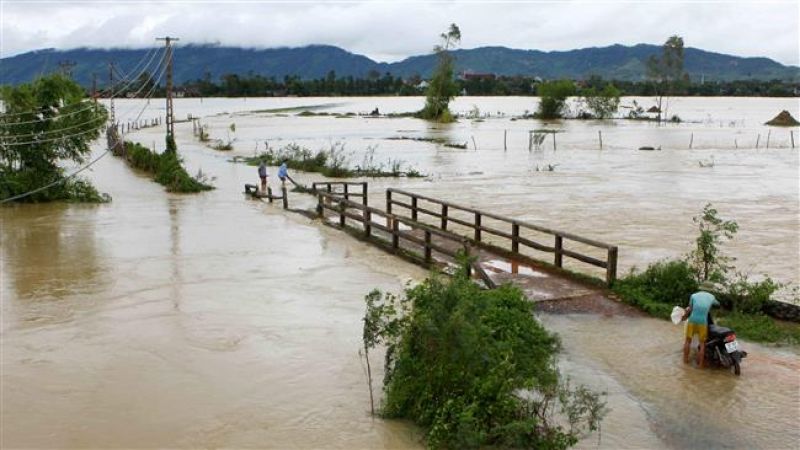 Death toll from flash floods and landslides in Indonesia jumped to 26