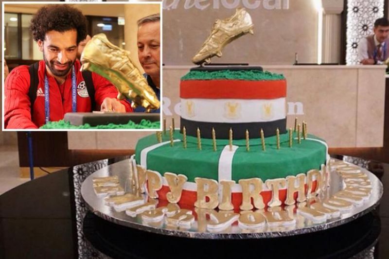 Cake decorated with a golden football boot