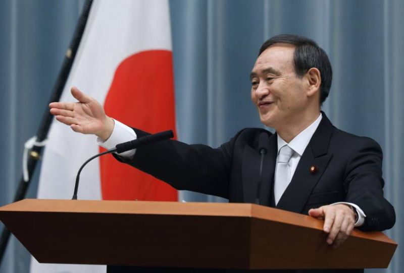 spokesman Yoshihide Suga 