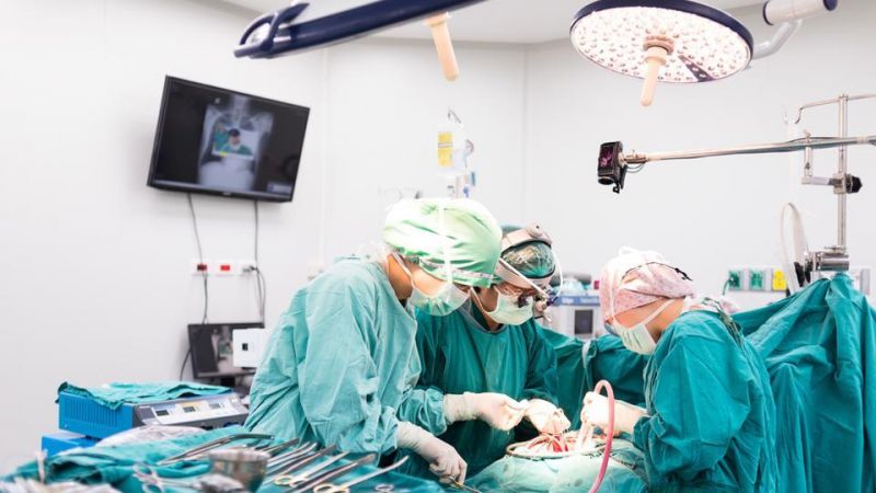 Doctors perform a surgery