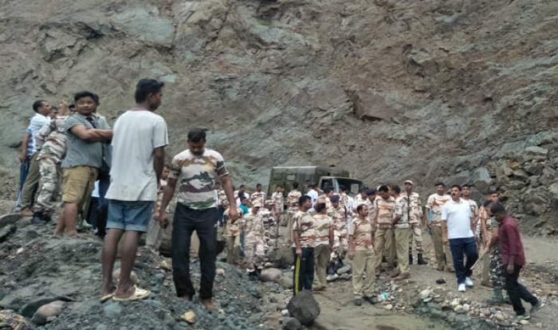 The boulder rolled down the mountain slope and smashed the minibus