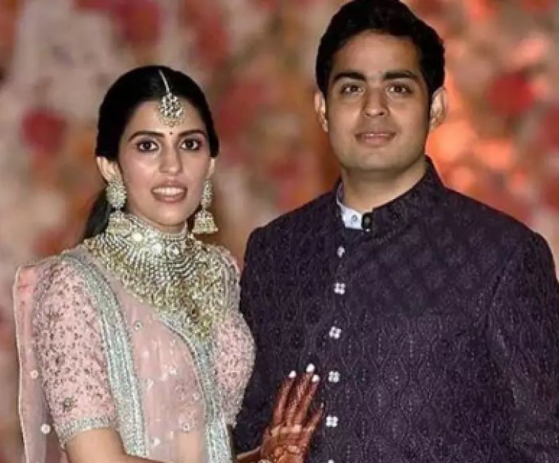 Akash Ambani with wife