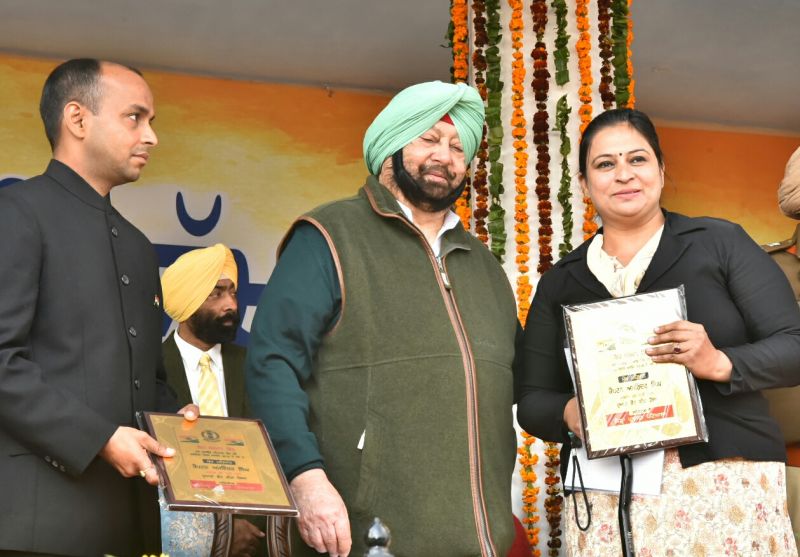 Captain Amarinder Singh honouring Assistant Professor of Rajiv Gandhi National University of Law