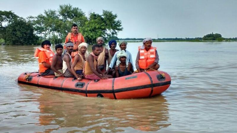 NDRF team rescuing flood-hit people