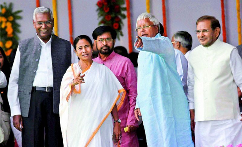 West Bengal counterpart Mamata Banerjee greets Lalu Yadav
