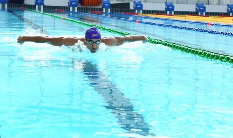 Khade put swimming on the backburner to focus on his job