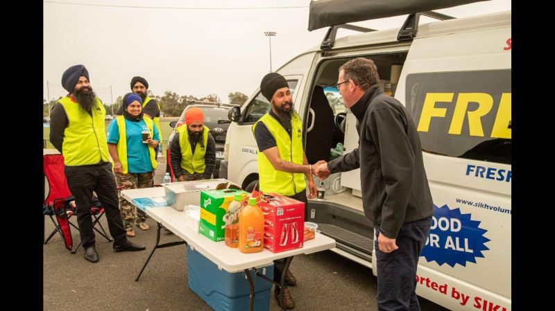Sydney Opera House sails illuminate with image of Sikhs helping bushfire victims