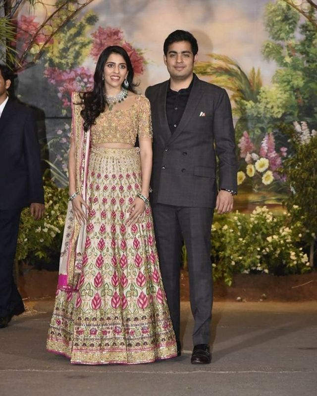 Sonamkapoor and anandahuja at wedding reception