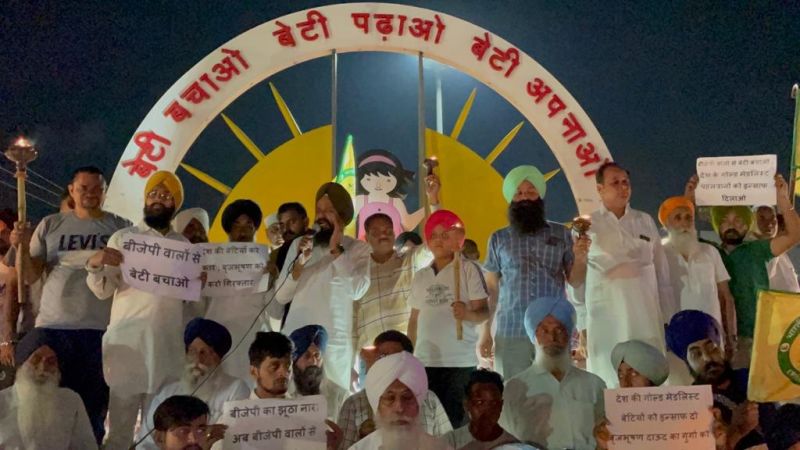 Members of BKU Shaheed Bhagat Singh organized a torch march at the historic Jagadhri Gate of Ambala in support of wrestlers