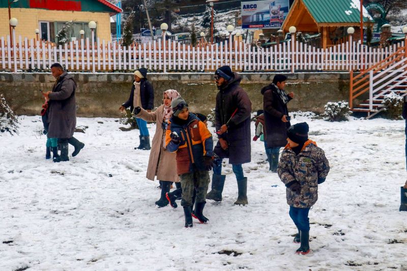 In Pics: Tourists Enjoying in the Enchanting Snowfall Bliss of Kashmir Valley