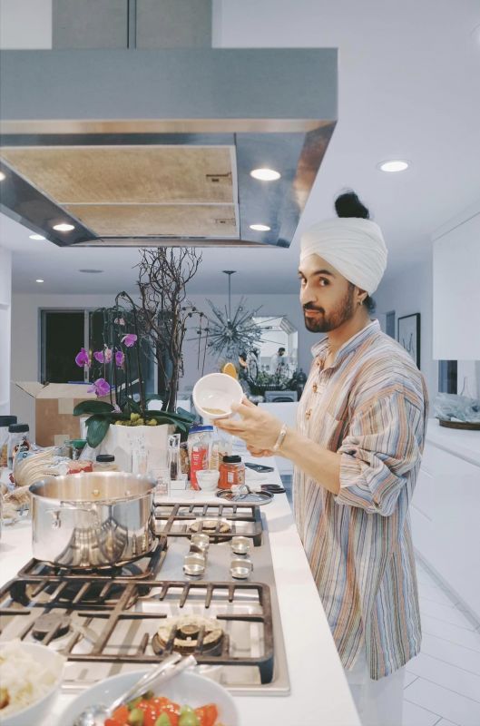 Celebrity Singer Diljit Dosanjh Exhibits 'Chamkila' Vibes While Creating Yummy Delights