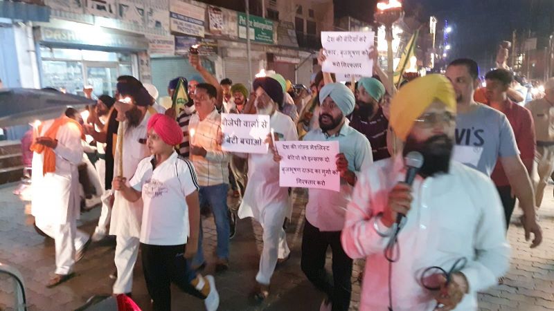 Members of BKU Shaheed Bhagat Singh organized a torch march at the historic Jagadhri Gate of Ambala in support of wrestlers