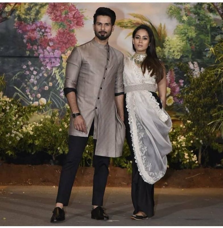 Sonamkapoor and anandahuja at wedding reception