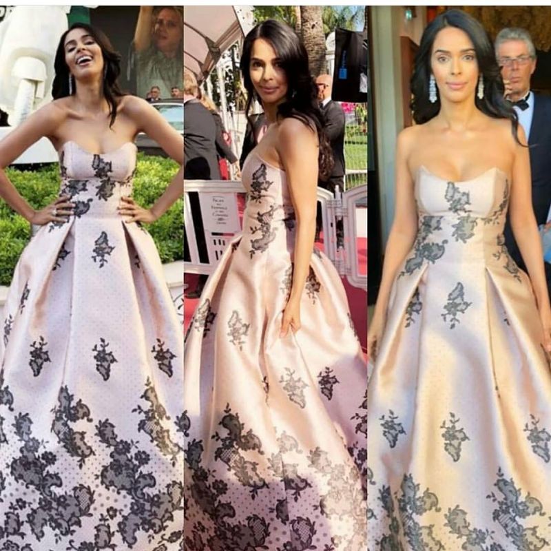 Mallika Sherawat made a stunning entry on the 5th day of cannes in baby pink gown