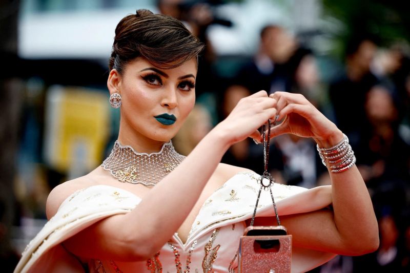 Urvashi Rautela Charms in a Cream-Blue Gown with Blue Lipstick at Cannes 2023, Look Reminds Fans of Aishwarya Rai
