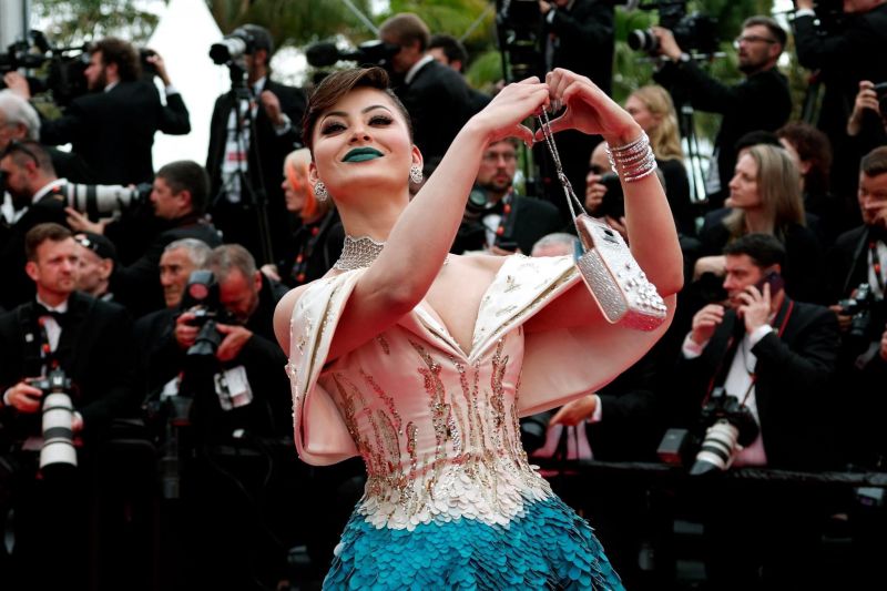 Urvashi Rautela Charms in a Cream-Blue Gown with Blue Lipstick at Cannes 2023, Look Reminds Fans of Aishwarya Rai
