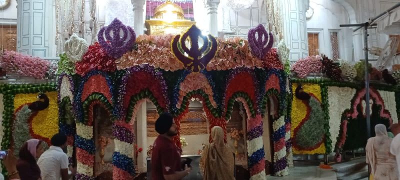 Exquisite Flower Decorations Adorn Golden Temple & Akal Takht Sahib for Sri Guru Granth Sahib Ji's Prakash Purab Celebration
