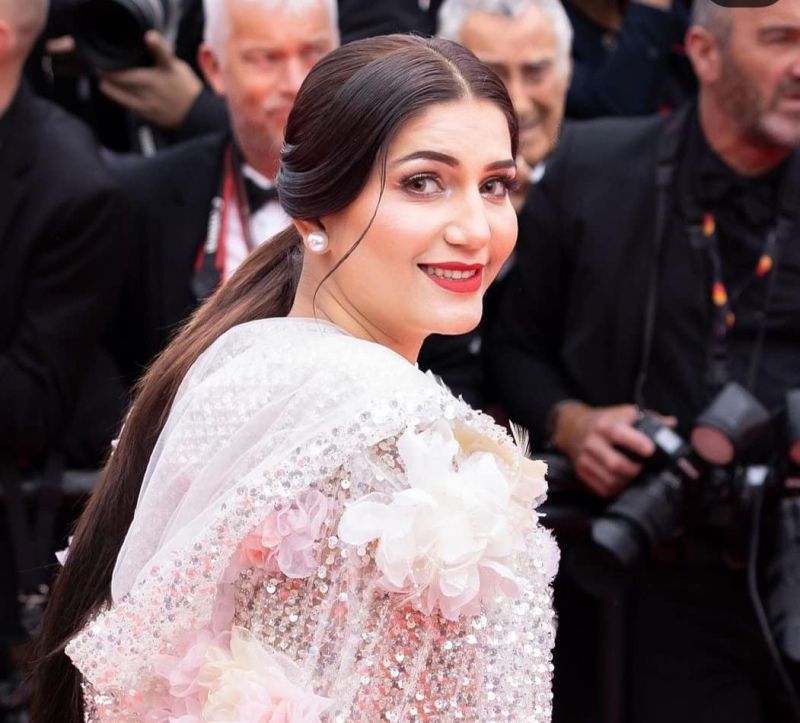 Sapna Choudhary Wears Feather Hood Gown at Cannes 2023
