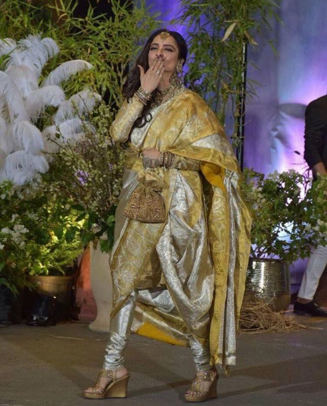 Sonamkapoor and anandahuja at wedding reception