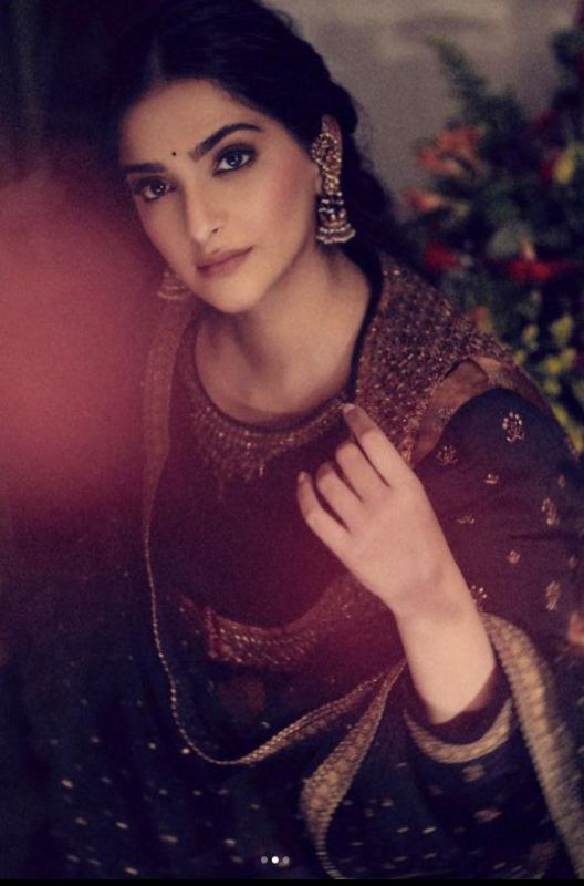 Sonam Kapoor completes her look with Ear cuff Jhumkas 
