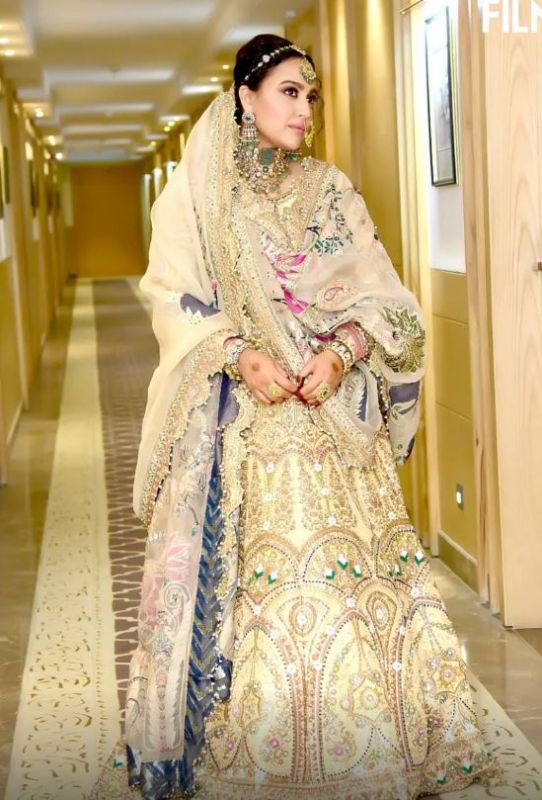 Fahad donned a Golden kurta, a white sherwani, with a dupatta
