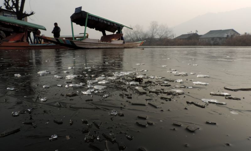 Dal Lake Freezes Over as Kashmir Grapples with Bone-Chilling Cold