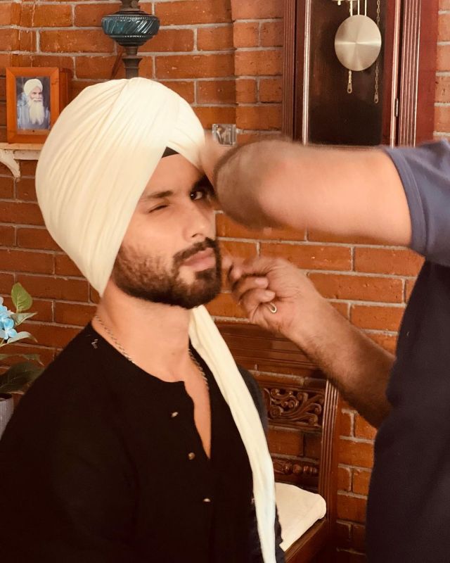Bollywood Actor Shahid Kapoor dropped photos on social media wearing a turban with his father Pankaj Kapur at a family wedding. He wrote, "Dad always says ghar pe Shaadi hogi to pag paega na." 
