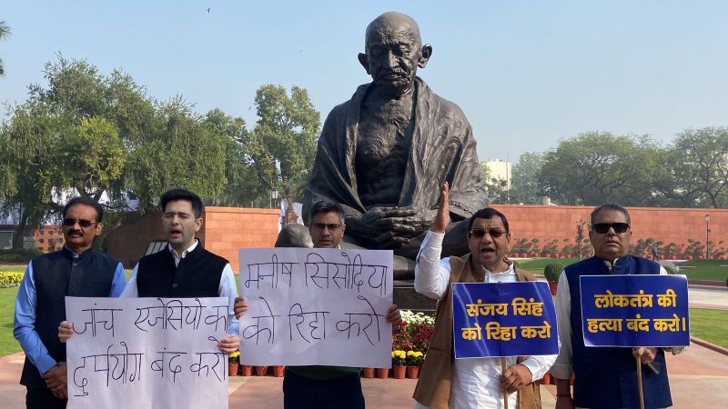 AAP Protests at Parliament's Mahatma Gandhi Statue Against Manish Sisodia & Sanjay Singh's Arrests