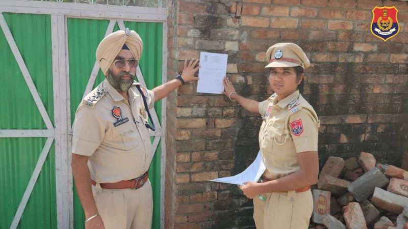 Sri Muktsar Sahib Police Take Bold Action: Seize Drug Dealer Kuldeep Singh's Property, Sends Strong Message Against Drug Trade. Notice posted outside the house. 
