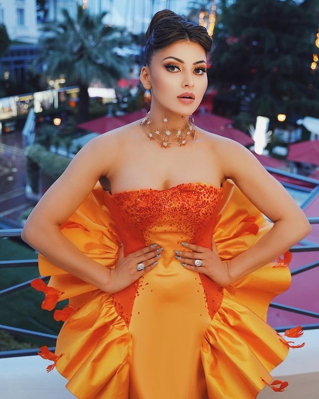 Cannes 2023: Urvashi Rautela Glowing in Orange Flower Gown

