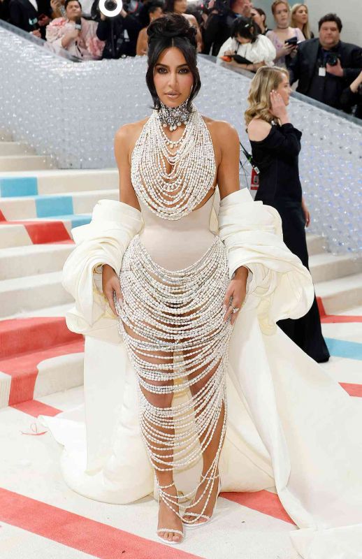 American model, media personality, and businesswoman Kim Kardashian wears pearl naked dress at Met Gala 2023
