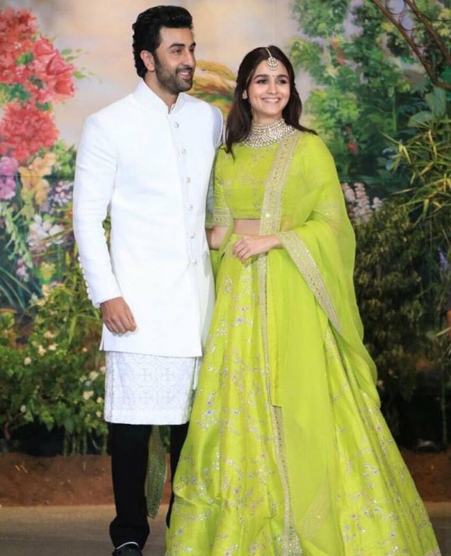 Sonamkapoor and anandahuja at wedding reception